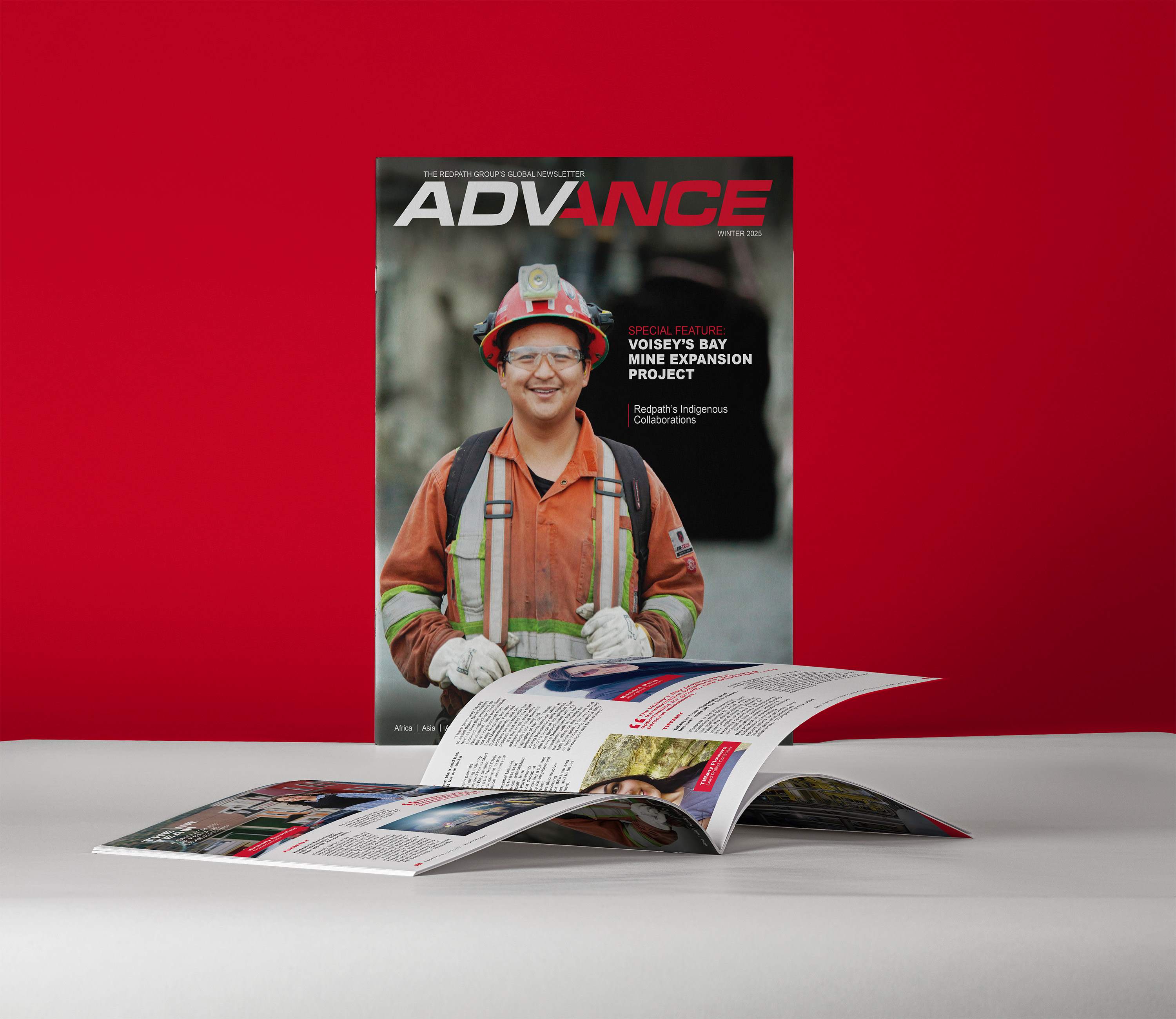 Cover of the Advance publication showing smiling worker at the Voisey's Bay Mine.